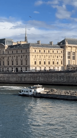 Rainbow appears over Seine River after Paris rainfall