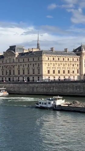 Rainbow appears over Seine River after Paris rainfall