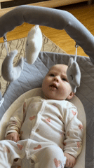 Mother documents morning routine with baby and cat in Chaikovsky