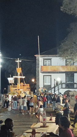 Historical festival with costumed reenactors and ship replica in Ribeira Grande