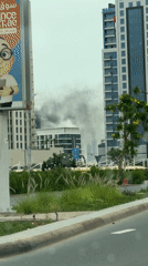 Smoke spotted rising between buildings in Dubai cityscape