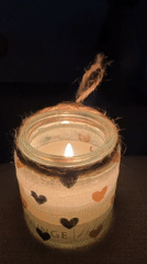 Candlelit jars and aurora projections in a moody Krefeld interior