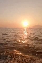 Boat ride off Pesisir coast at golden hour