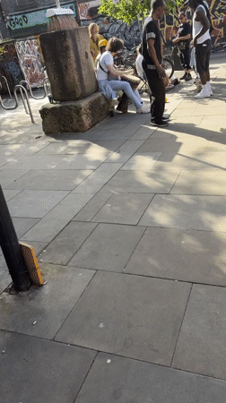 Street performers draw crowds near Manchester mural