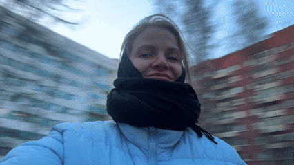 Woman films selfies in Saint Petersburg park playground