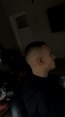 Young man gets stylized haircut at Bulgarian barbershop