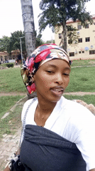 Woman with baby photographed in Keffi, Nigeria