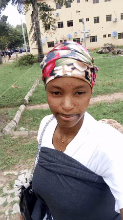 Woman with baby photographed in Keffi, Nigeria