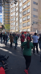 Street gathering with flags observed in La Paz, Bolivia