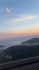 Sunset highway journey through coastal Montenegro captured near Brajici