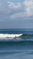 Early morning surfing session captured off Kediri coast