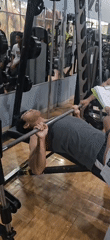Gym session in Bekasi: bench press sets and floor activity