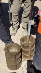 Workers conduct concrete testing procedures in Putre, Chile