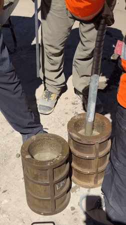 Workers conduct concrete testing procedures in Putre, Chile