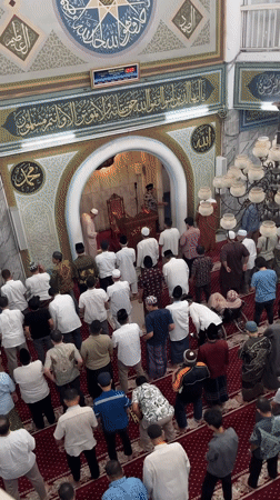 Friday prayers and street life in West Jakarta