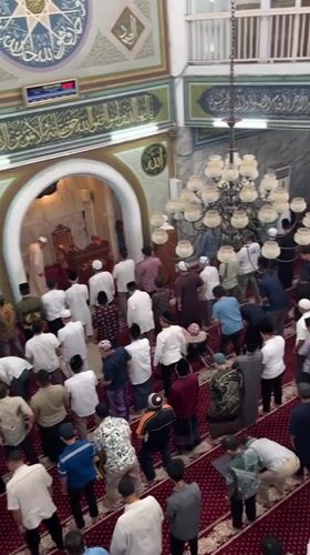 Friday prayers and street life in West Jakarta
