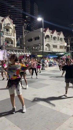 Nighttime group fitness class draws dozens to Pattaya square