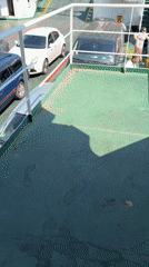 Ferry crossing the Bay of Kotor on a clear summer day