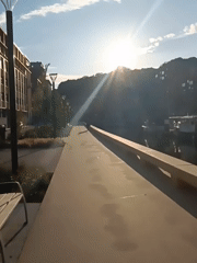 Peaceful canal scene documented in Leuven with boats and buildings