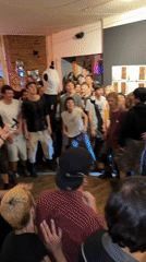 Evening gathering at a Berlin venue with art and performance