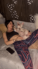 London woman enjoys quiet evening at home with pets