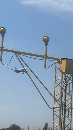 Aircraft lands at Tashkent airport under clear skies
