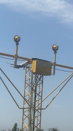 Aircraft lands at Tashkent airport under clear skies
