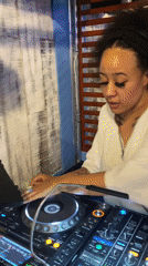 DJ performs at London restaurant serving Caribbean cocktails