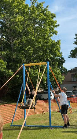 Aerial acrobatics on a swing set in Haapsalu, Estonia