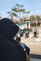 Community gathering at a public space in Playen, Indonesia