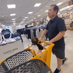 Mall outing in Wonju-si with escalators, shopping carts, and retail browsing