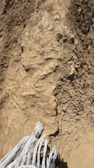 Person documented on rocky terrain near Bokonbayevo, Kyrgyzstan