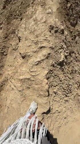 Person documented on rocky terrain near Bokonbayevo, Kyrgyzstan