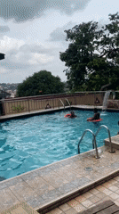 Daily life scenes documented: swimming, commerce, street activity