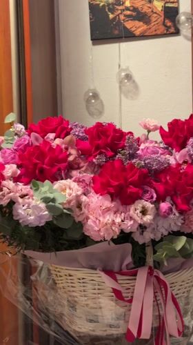 Flower basket with pink ribbon observed in Moscow