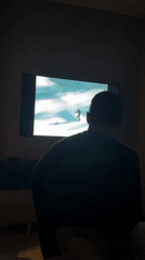 Friends gather for casual drinks and TV viewing session