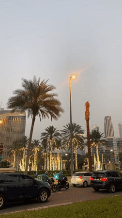 Dubai street scenes captured during hazy afternoon hours