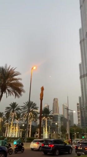 Dubai street scenes captured during hazy afternoon hours