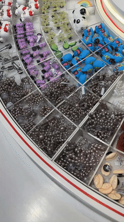 Shopper browses Crocs charms and body wash in Da Nang store