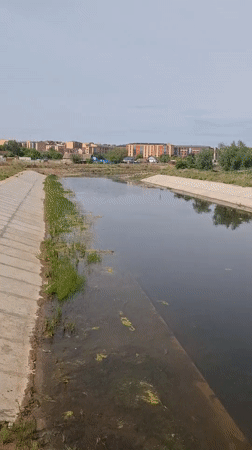 Canal and gas station documented in Kokshetau, Kazakhstan