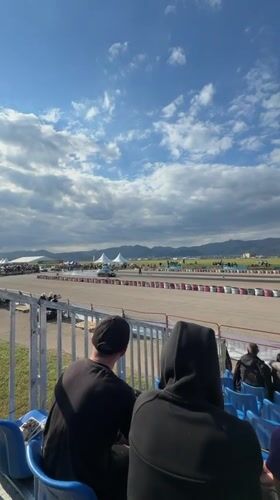 Spectators watch track race from bleachers in Sliven