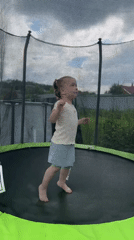 Backyard trampoline play and a flower offering in Sylva