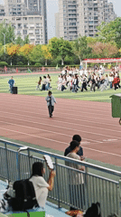 Students gather at Chongqing sports facility during morning hours