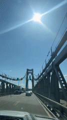 Driver crosses suspension bridge into Dutchess County under sunny skies