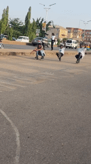 Young rollerbladers perform street stunts in Jos, Nigeria