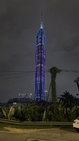 Illuminated skyscrapers captured in nighttime Kuala Lumpur photographs