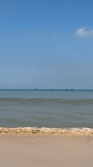Quiet beach and construction equipment spotted in Kuta