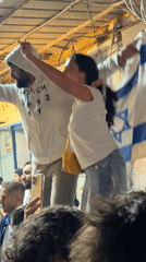 Large crowds gather for nighttime street celebration in Tel-Aviv