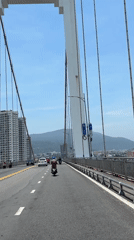 Morning traffic crosses cable bridge in Đà Nẵng, Vietnam