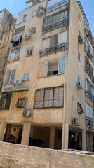 Morning street life on a residential block in Netanya